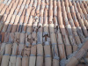 Roof tiles damaged by hail.